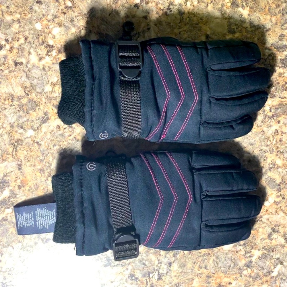 Women's pink and black winter gloves.